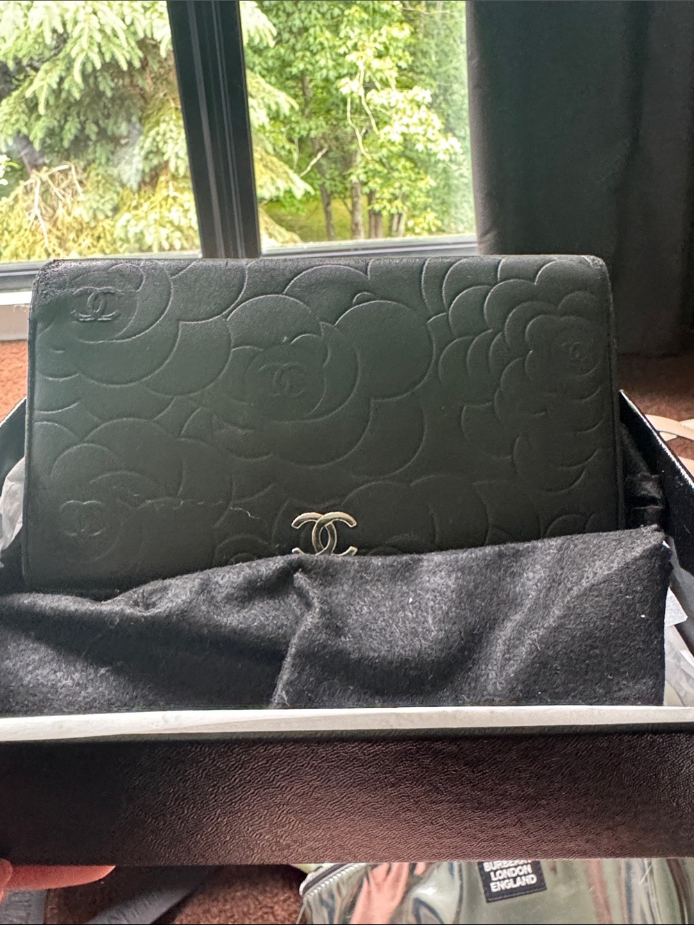 CHANEL Black Camellia-Embossed Leather Wallet on Chain with CC Logo
